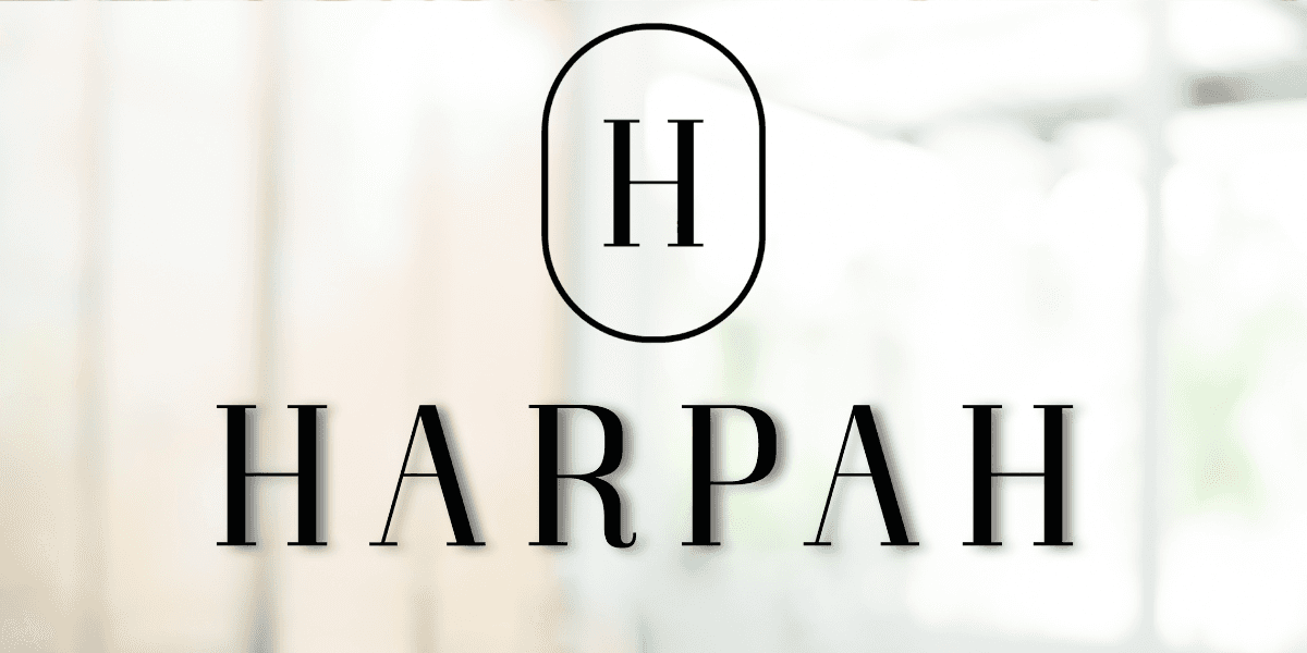 HARPAH logo in sleek design, reflecting a modern luxury clothing brand focused on minimalist style, performance, and empowerment.