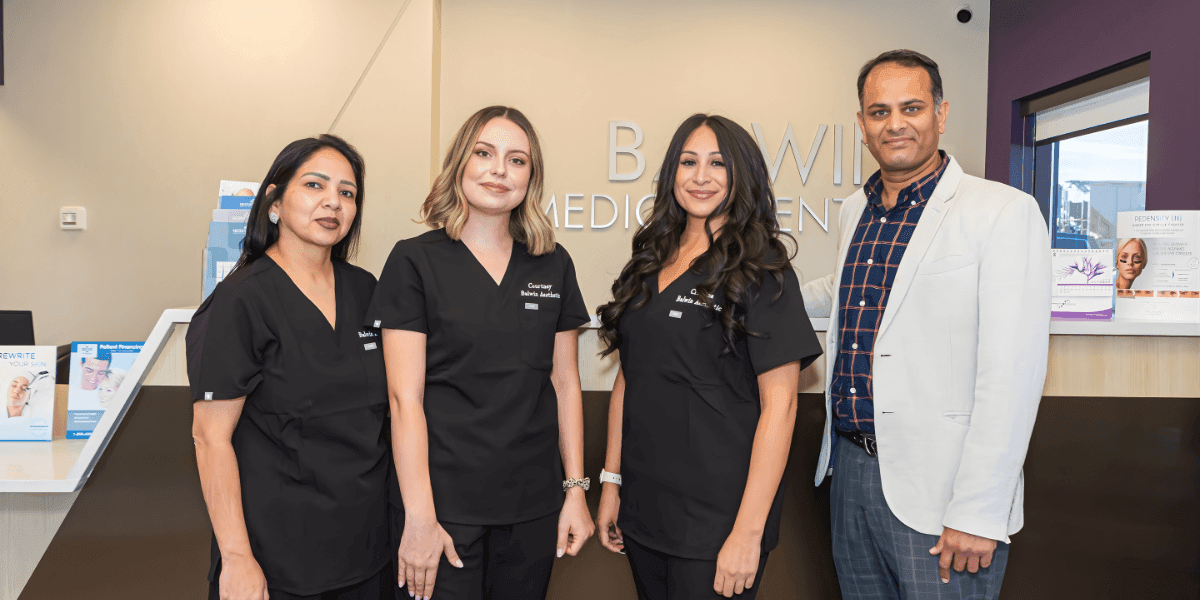 Dr. Sameer Sardesai and his team of professionals at Balwin Aesthetics, offering advanced aesthetic treatments in a clinic setting.