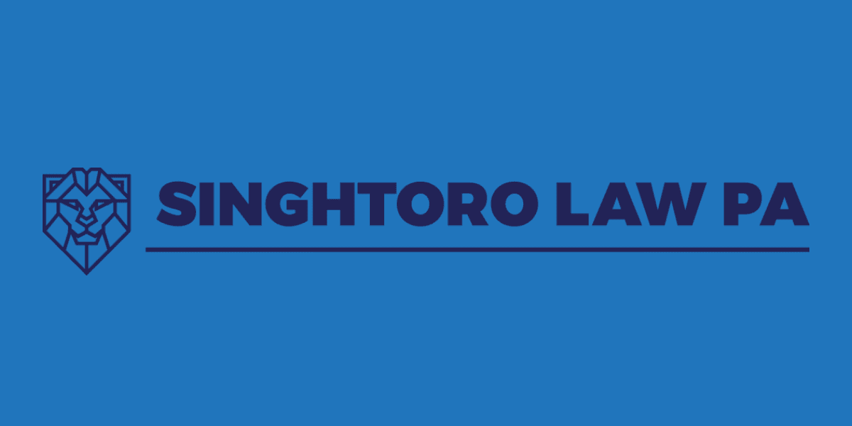 Singh Toro Law logo with a lion emblem, representing strength and stability in personal injury law services.
